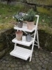 Country Charm Stepped Plant Stand In Patio Setting