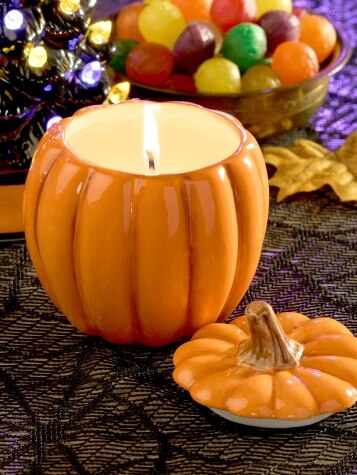 Ceramic Pumpkin Candle In Halloween Setting