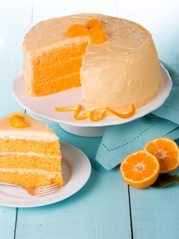 Sliced Orange Layer Cake on Plate