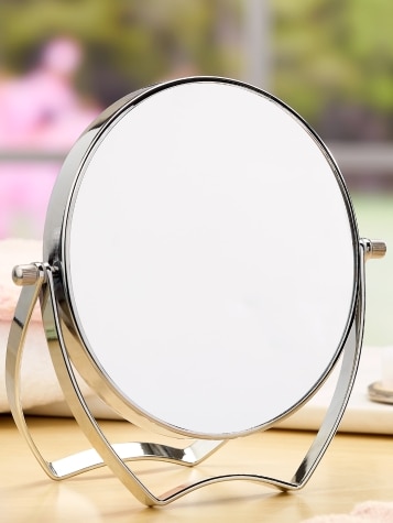 Double-Sided Magnifying Mirror In Bedroom Setting
