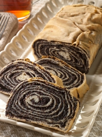 Swirled Slices of Poppy Seed Almond Roll on Tray