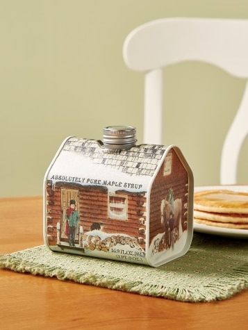 Cabin Tin of Maple Syrup with Pancakes on Table