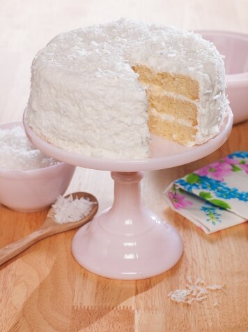 3 Layers of Golden Cake with Coconut Frosting
