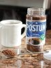 Postum Instant Beverage on Table with Mugs