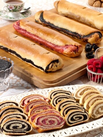 Four Flavors of Roll Pastries with Slices on Tray